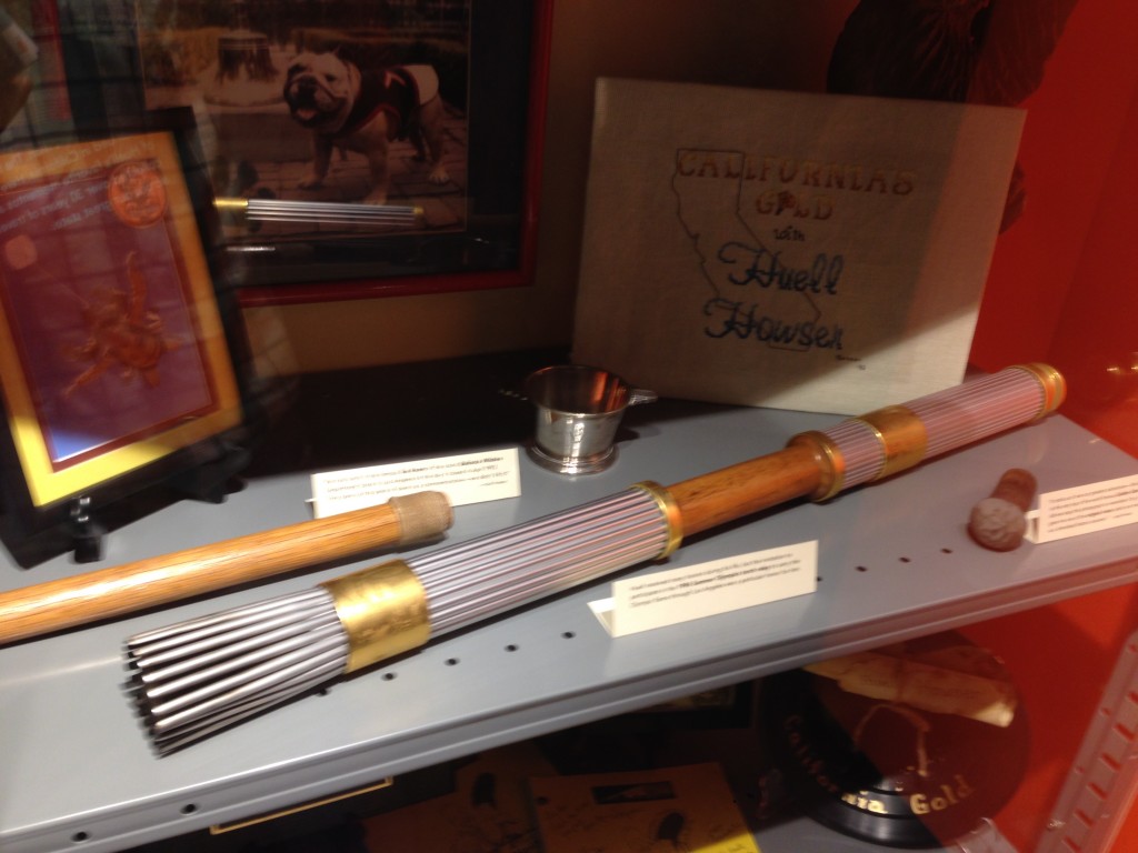 One of the many display cases of Huell's mementos from people he met - including the 1996 Olympic torch he carried